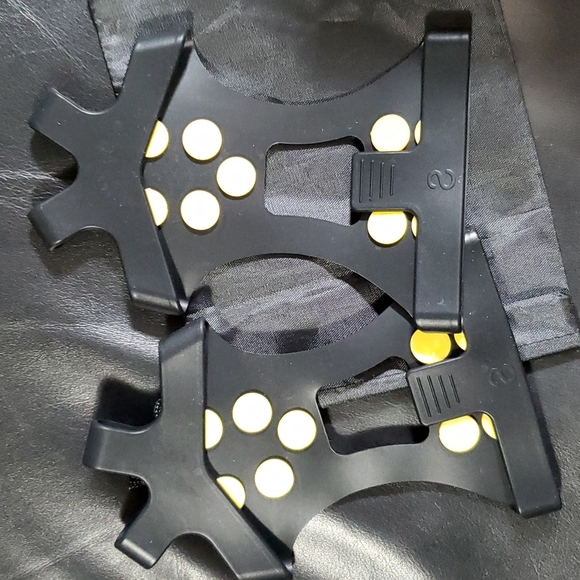A women's size small pair of ice cleats. - Picture 2 of 2